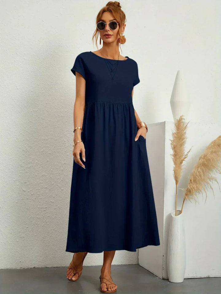 Abito midi elegante fluido e senza tempo per donna