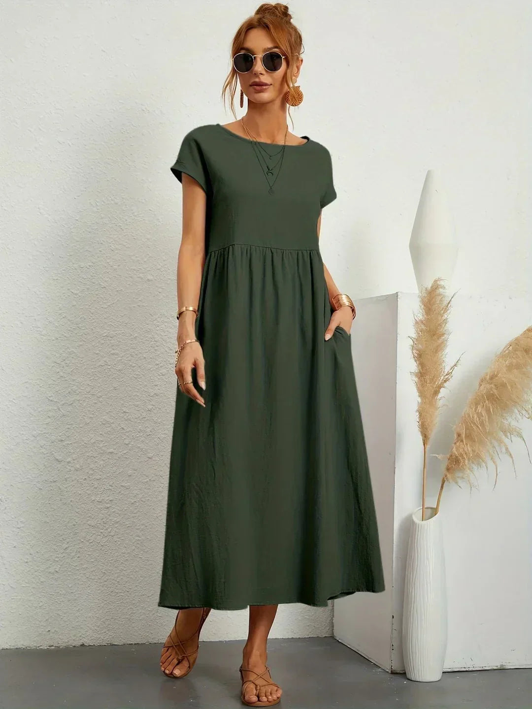 Abito midi elegante fluido e senza tempo per donna