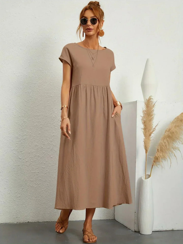 Abito midi elegante fluido e senza tempo per donna