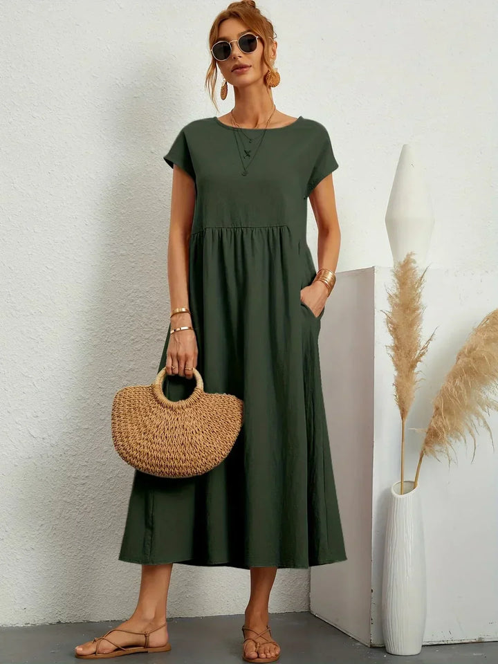 Abito midi elegante fluido e senza tempo per donna