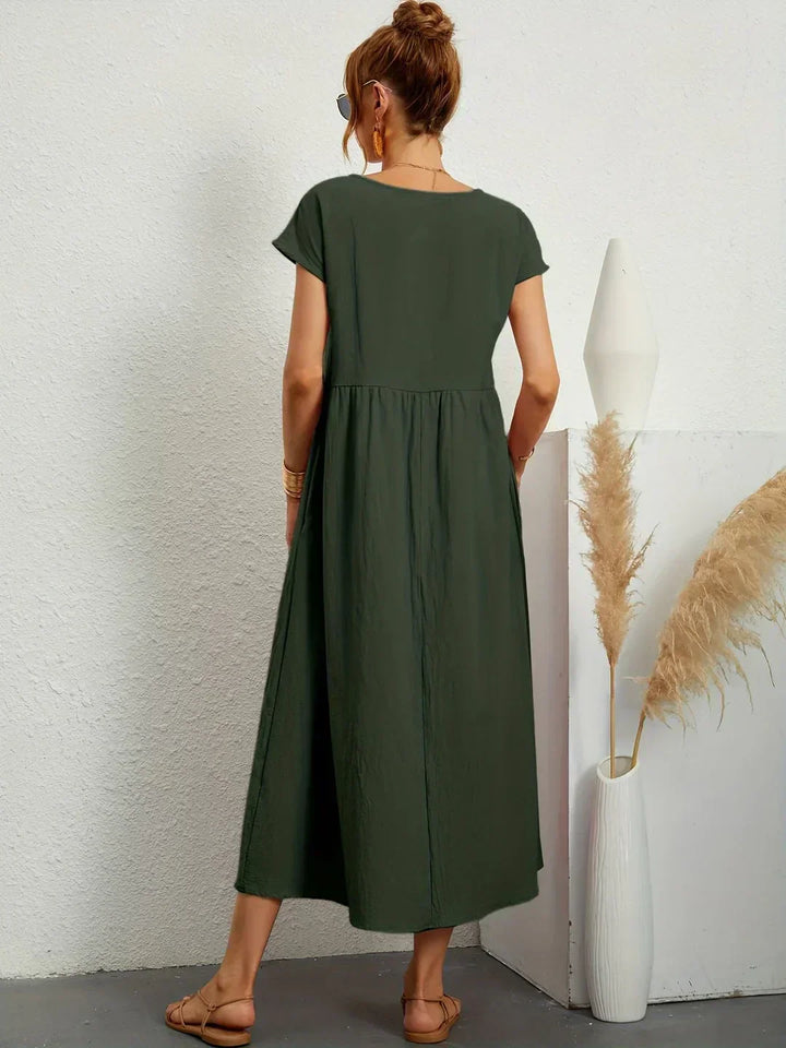 Abito midi elegante fluido e senza tempo per donna