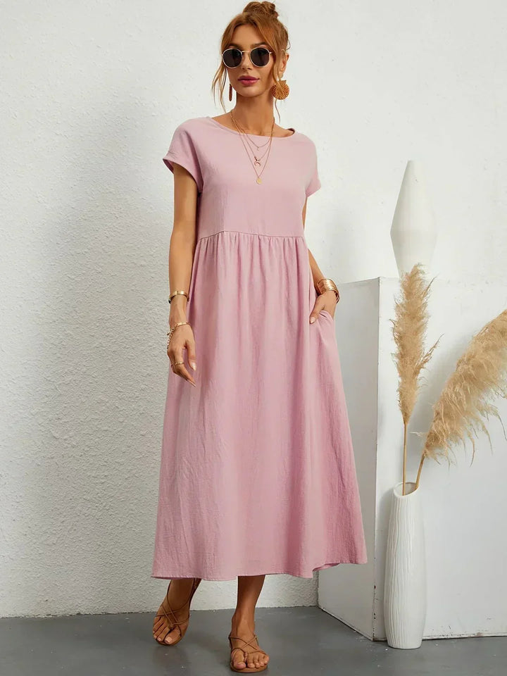 Abito midi elegante fluido e senza tempo per donna