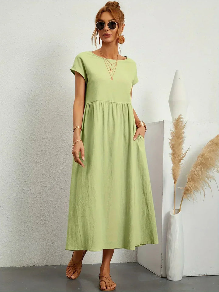 Abito midi elegante fluido e senza tempo per donna