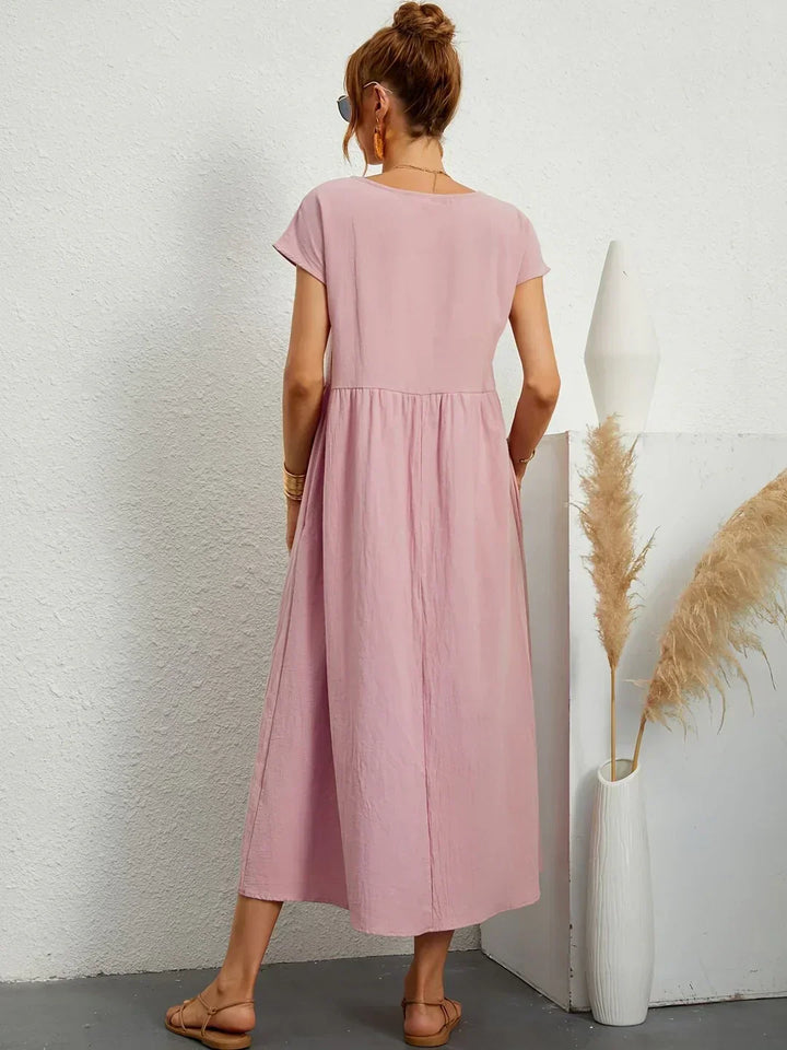 Abito midi elegante fluido e senza tempo per donna