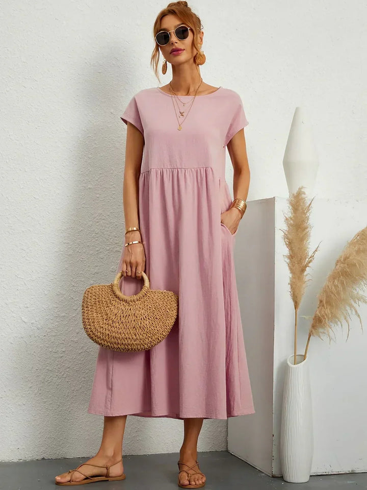 Abito midi elegante fluido e senza tempo per donna