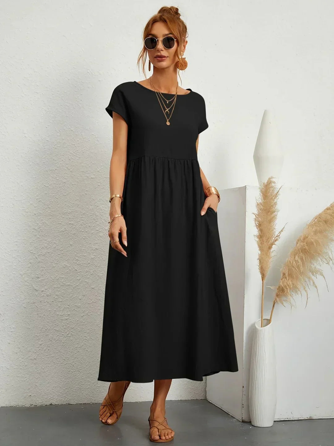 Abito midi elegante fluido e senza tempo per donna