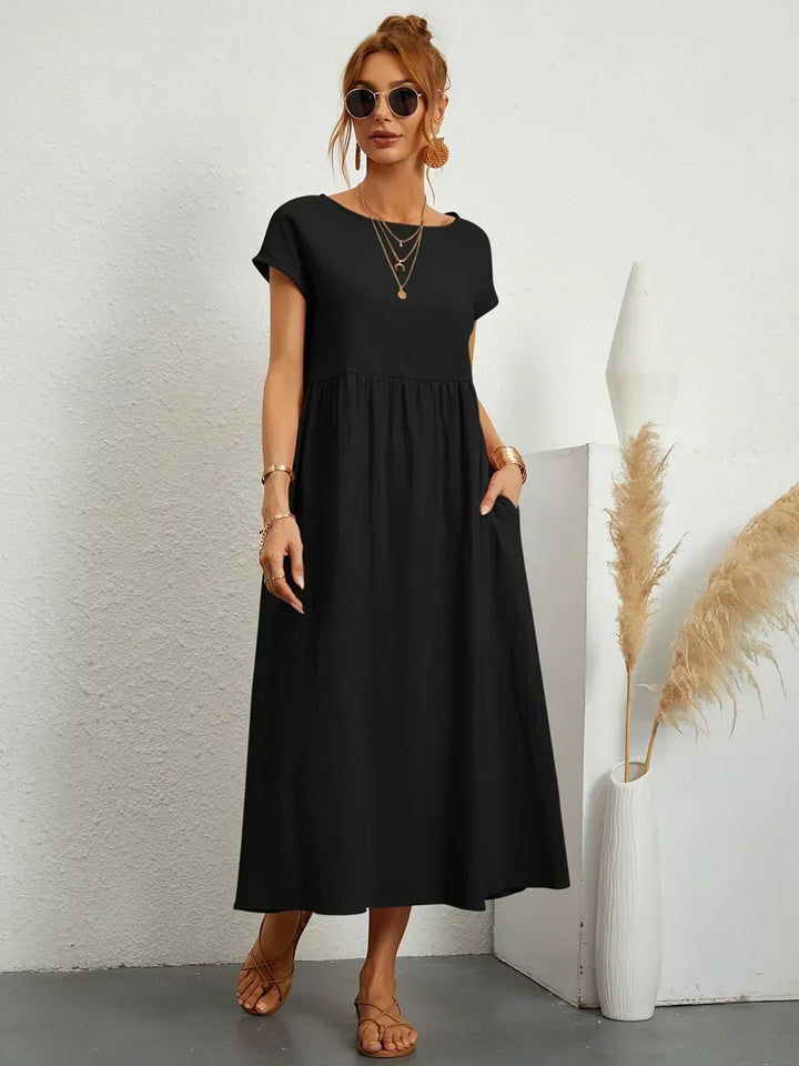 Abito midi elegante fluido e senza tempo per donna