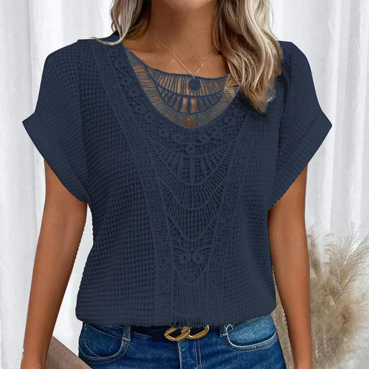 Top elegante in pizzo leggero e traspirante per donna