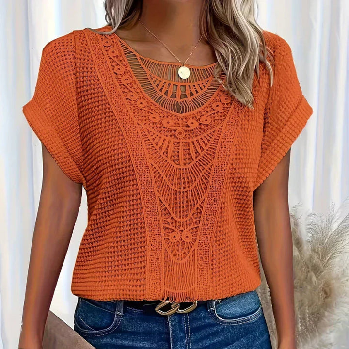 Top elegante in pizzo leggero e traspirante per donna