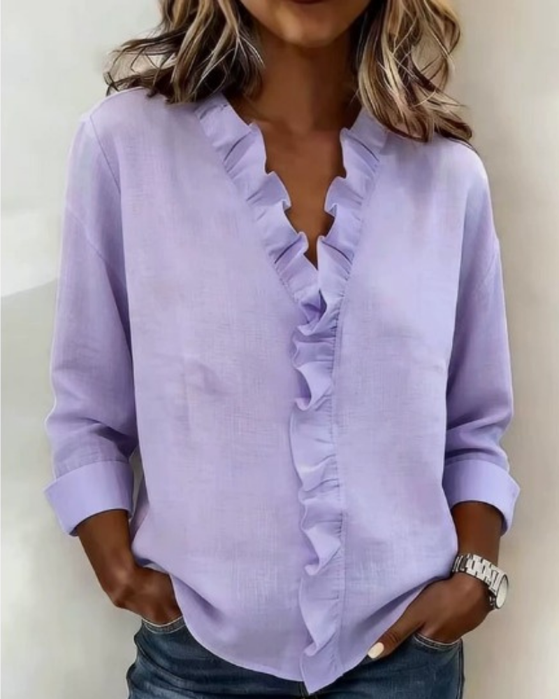 Blusa elegante da donna con scollo a V e volant