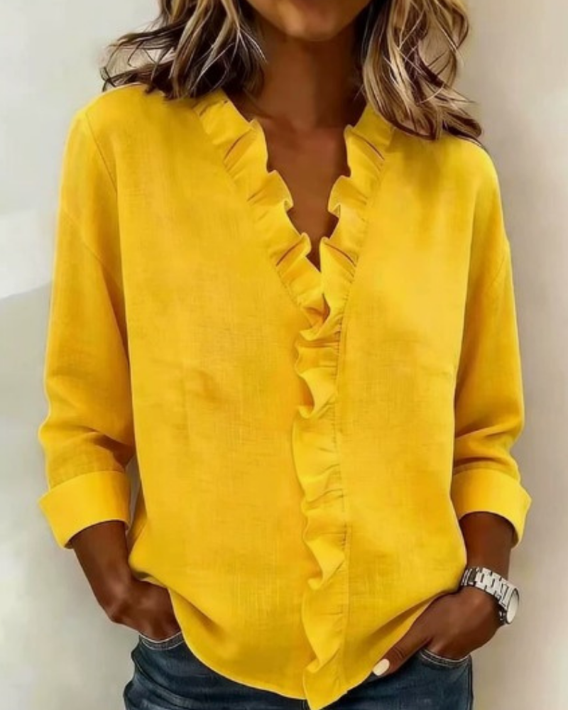 Blusa elegante da donna con scollo a V e volant
