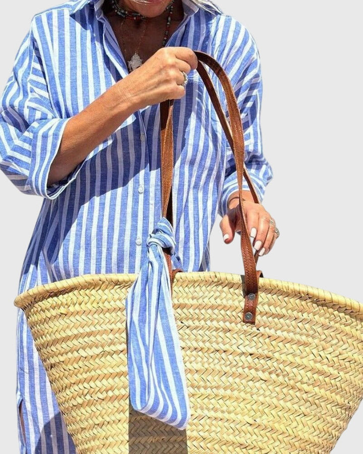 Abito a righe elegante e fluido per donna