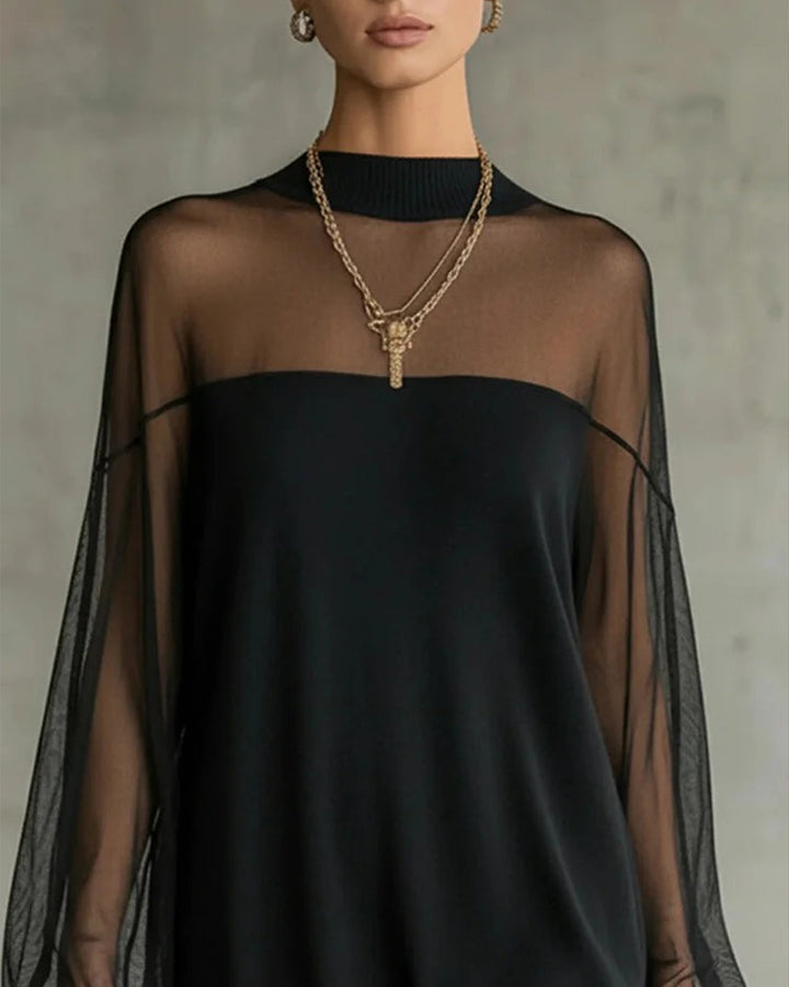 Abito elegante in maglia con maniche in tulle trasparente per donna