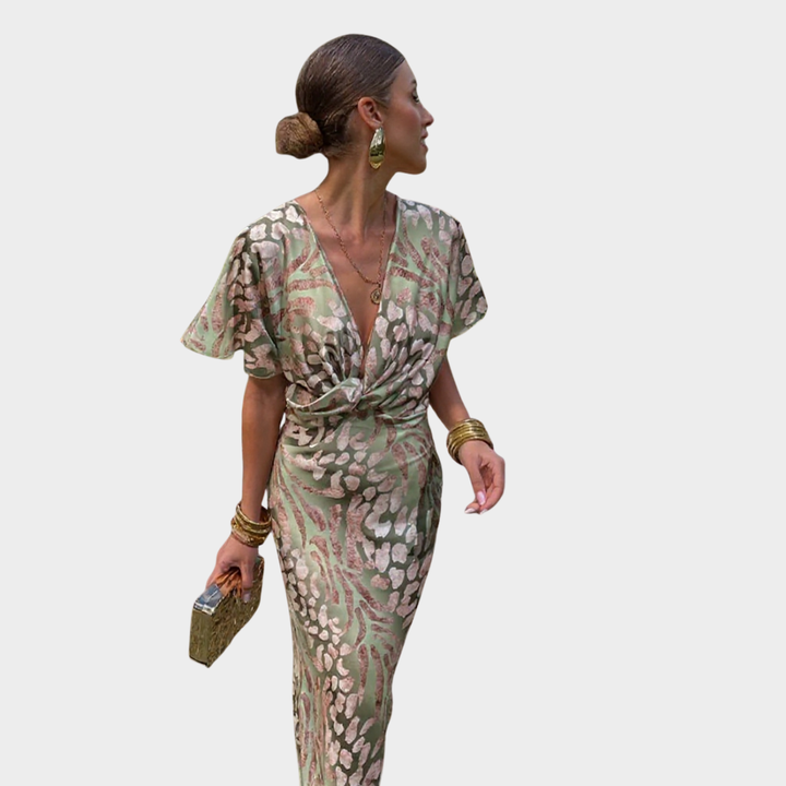 Abito midi fluido da donna elegante con cintura annodata