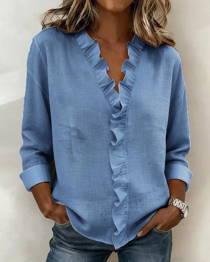 Blusa elegante da donna con scollo a V e volant