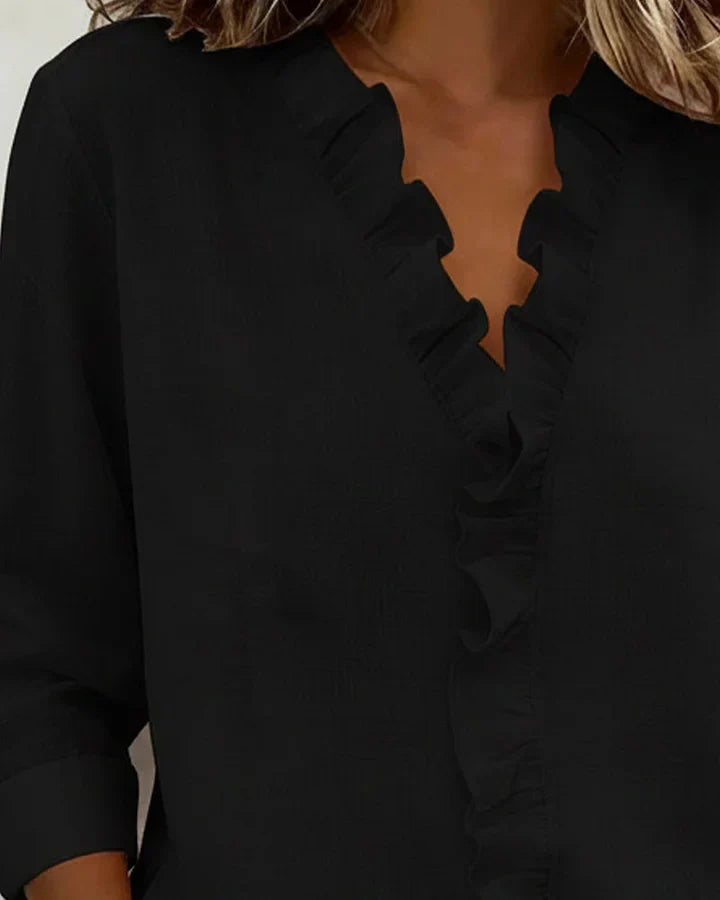 Blusa elegante da donna con scollo a V e volant