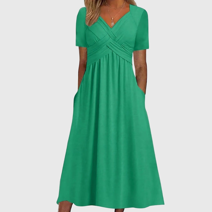 Abito midi elegante con effetto contenitivo e vestibilità fluida per donna