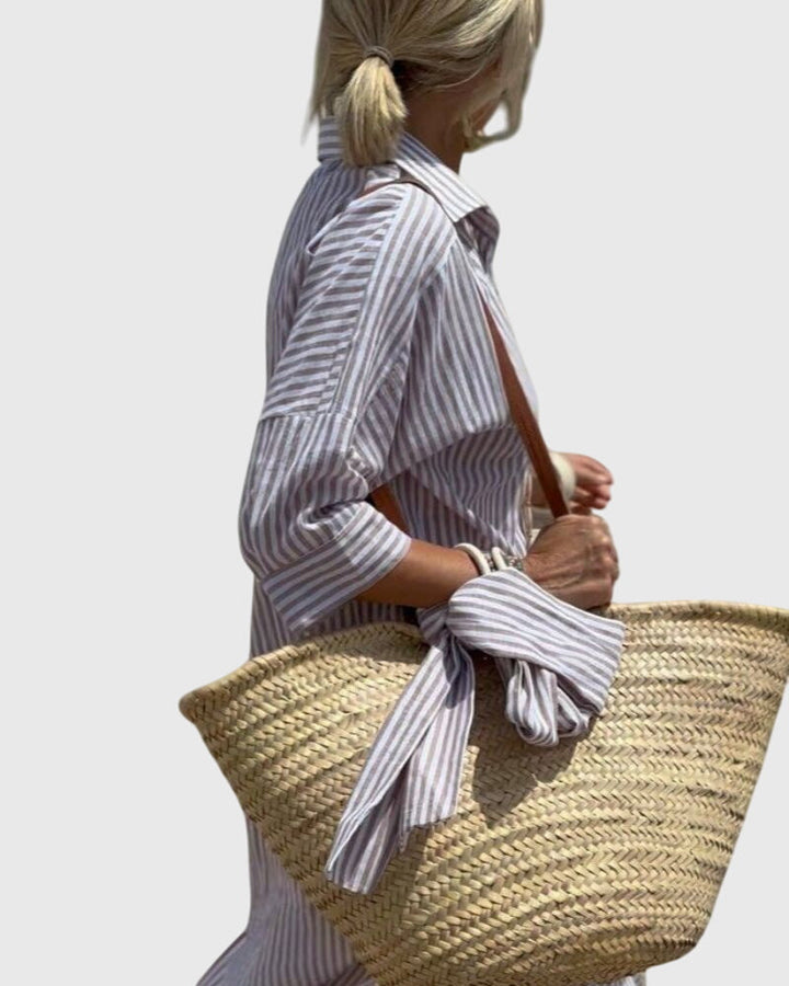 Abito a righe elegante e fluido per donna