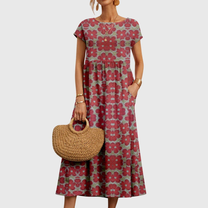 Abito floreale elegante e fluido per donna