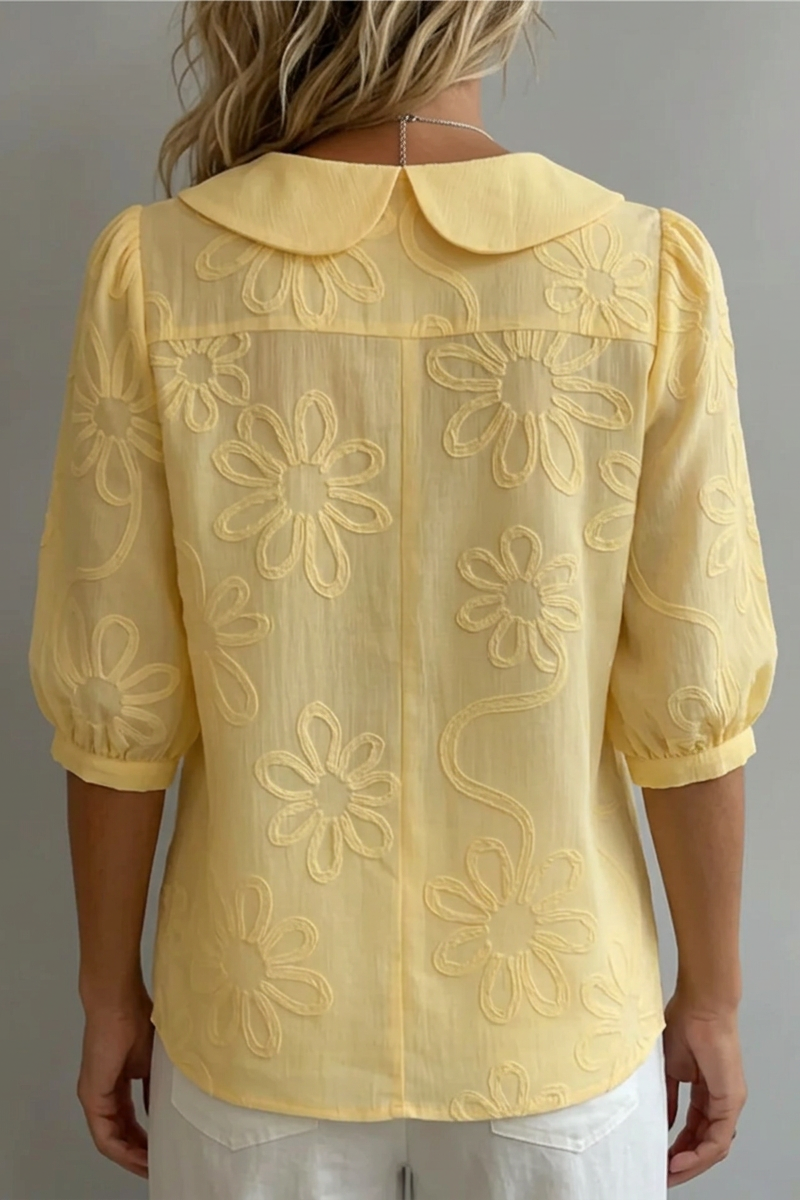 Blusa elegante da donna con collo rotondo e ricamo floreale