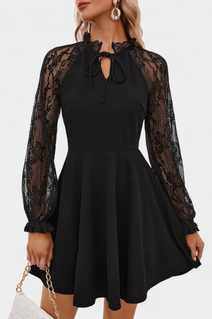Abito elegante in pizzo con maniche lunghe per donna