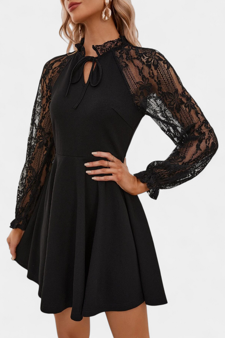 Abito elegante in pizzo con maniche lunghe per donna