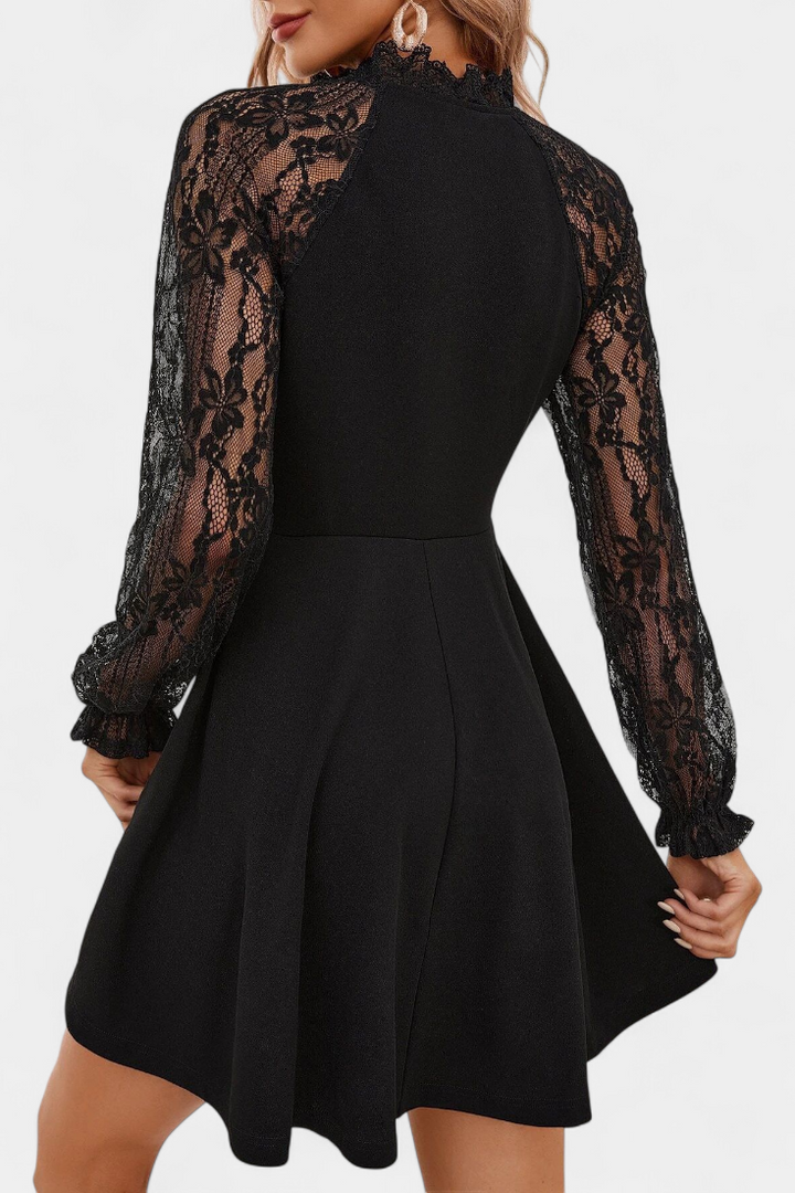 Abito elegante in pizzo con maniche lunghe per donna