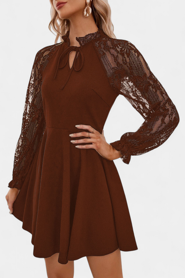 Abito elegante in pizzo con maniche lunghe per donna