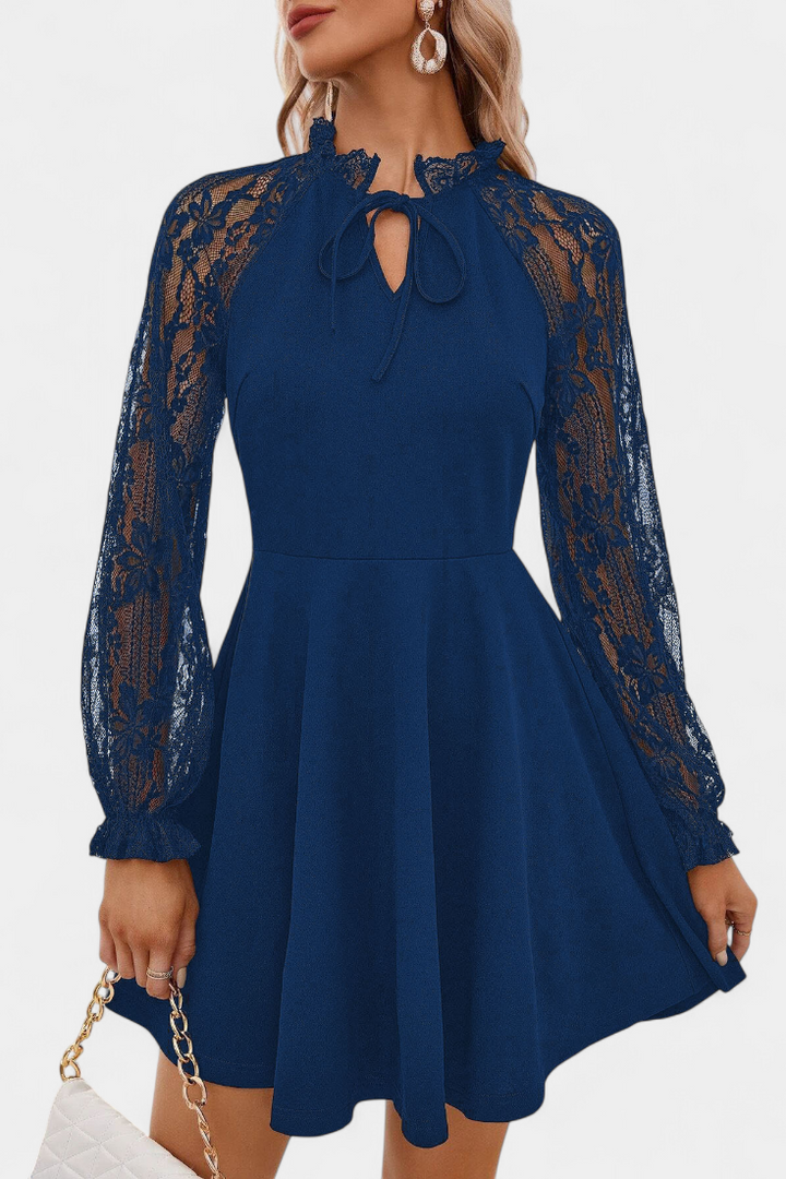 Abito elegante in pizzo con maniche lunghe per donna