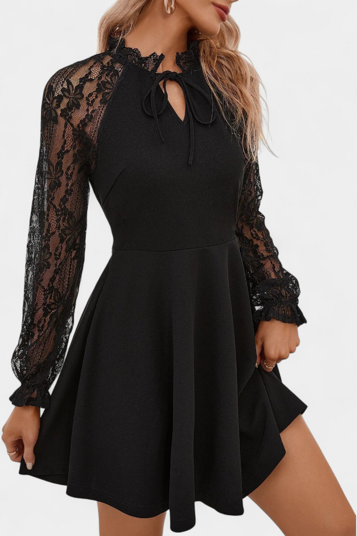 Abito elegante in pizzo con maniche lunghe per donna