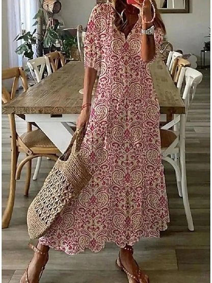 Abito boho elegante fluido con stampa geometrica per donna