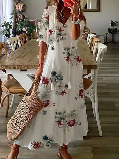 Abito boho elegante fluido con stampa geometrica per donna